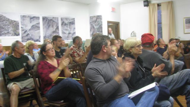 Citizens attending the Sept 12, 2011, Town Board meeting, applauding people who helped out in the flood: Photo by Rusty Mae Moore